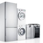 Stainless steel kitchen appliances: refrigerator, washer dryer, dishwasher, stove by Cardinal Heating.