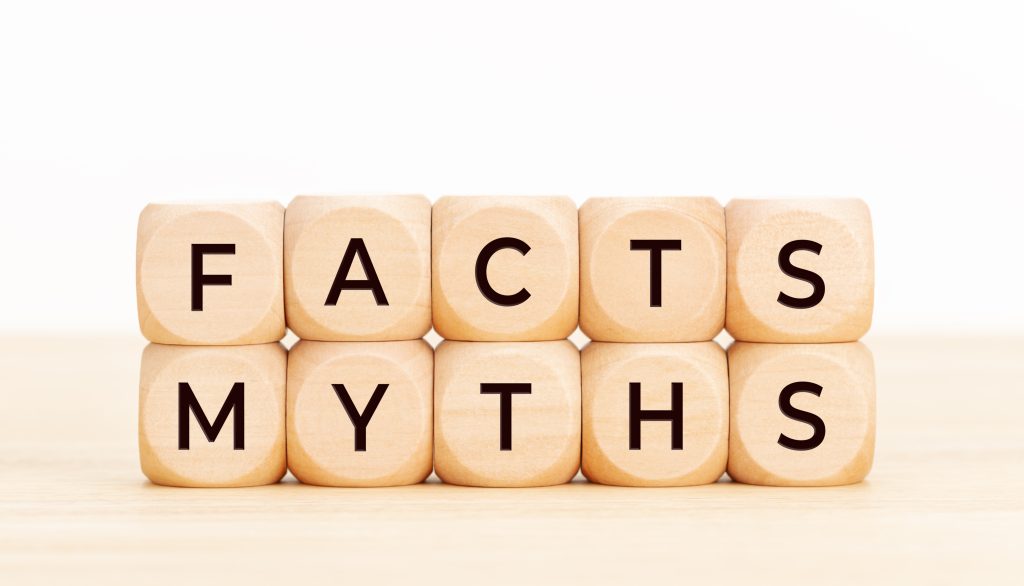 Wooden blocks with "FACTS" and "MYTHS" about HVAC furnace maintenance by Cardinal Heating.